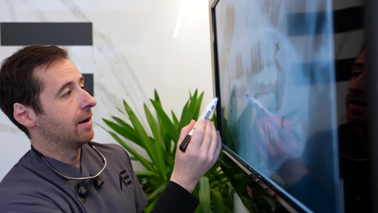 Dentist Explaining Dental X-Ray