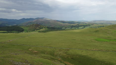 aerial dropping shot of the open countryside in the lake district