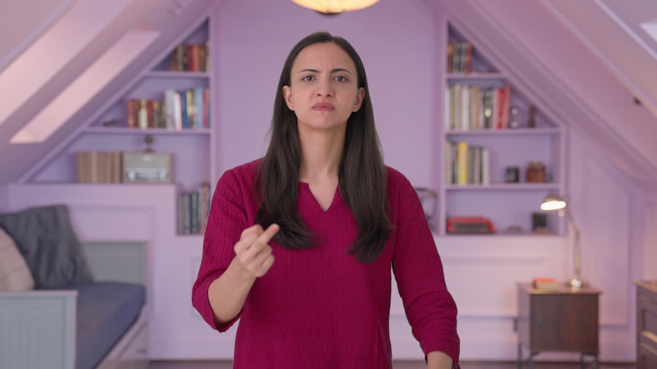 Angry Indian woman showing middle finger