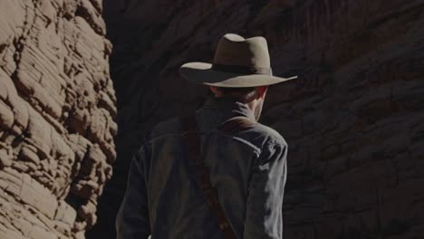 Man Hiking in a Canyon