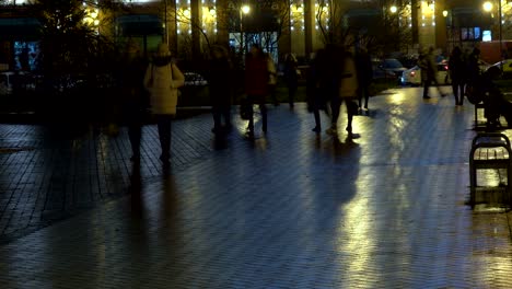 anonymous people walking at  in the night city.  time lapse. kaliningrad - november 2017 russian.