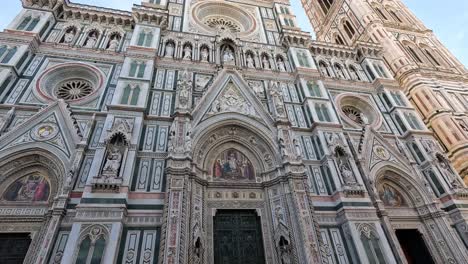 tourists admire florence cathedral's intricate facade