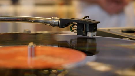 The-needle-of-an-old-vinyl-record-player-slides-on-the-surface-of-the-record