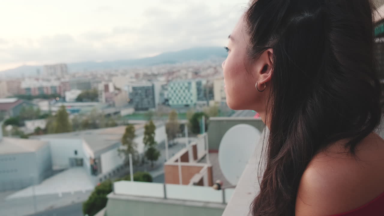 Woman Looking at Cityscape