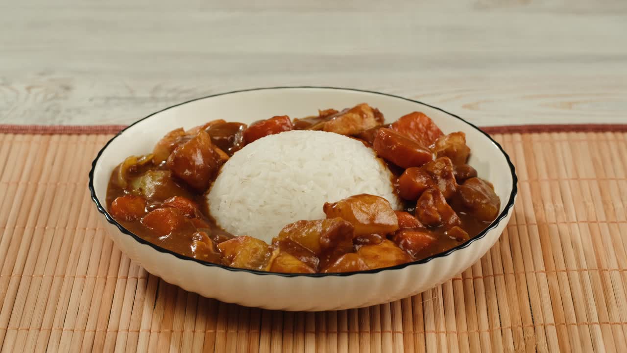 Japanese curry rice with fry pork Tonkatsu, Katsu Kare, Japanese breaded cooking dinner in restaurant, close up macro of asian food