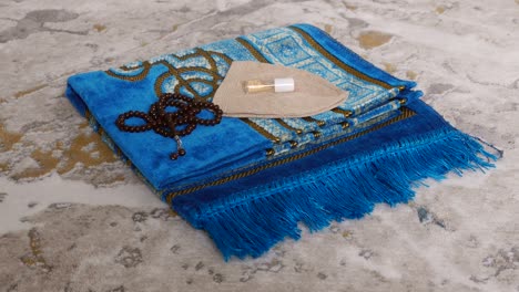 worship materials used by muslims, prayer beads prayer rugs and fragrance,