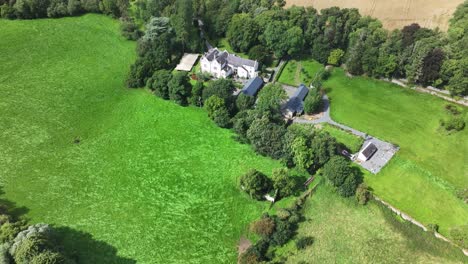 Aerial-Shot-Tilting-up-Toward-Estate