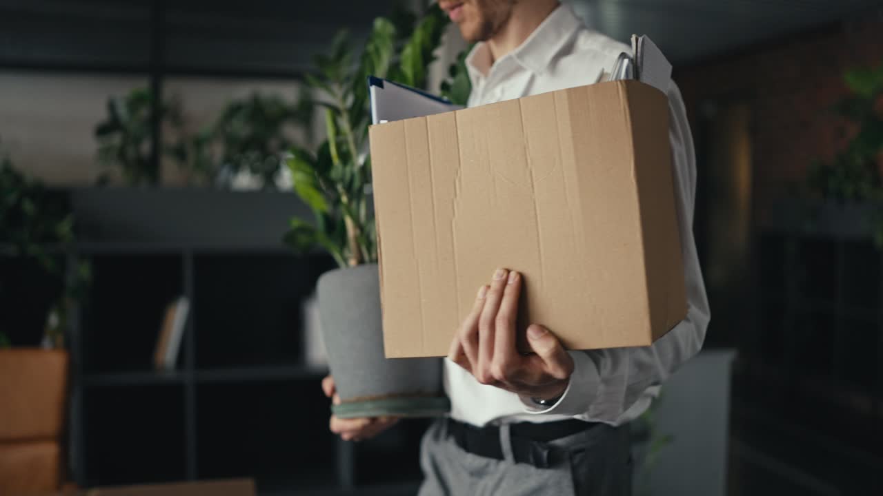 Office Scene with Plant, Desk, and Moving Box