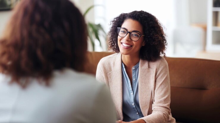 Professional Woman Having a Friendly Conversation in an Office Setting