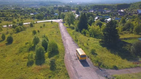 yellow bus on a country road