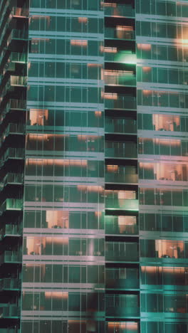 night view of a modern glass skyscraper