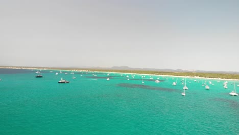 Spain,-Mallorca-Platja-des-Trenc-beach-a-beautiful-fly-by-over-the-beach-at-4k-24-fps-with-ND-filters-on-a-very-bright-day-with-a-DJI-Mavic-Air-drone