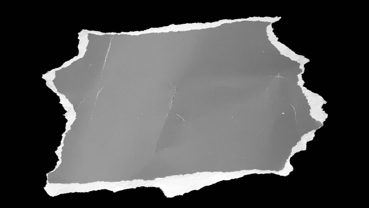 Torn Gray Paper Pieces Appearing and Disappearing on Black Background