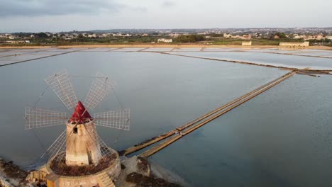 Windmill-And-Saline-Near-The-Town-Mazara-del-Vallo-In-The-Province-Of-Trapani,-Southwestern-Sicily,-Italy