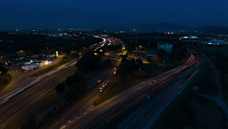 Cinematic-highway-road-view-at-night-time,-aerial-hyper-lapse