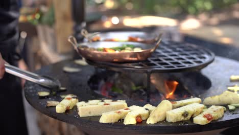 focaccia grilled bowl with open fire in the center.