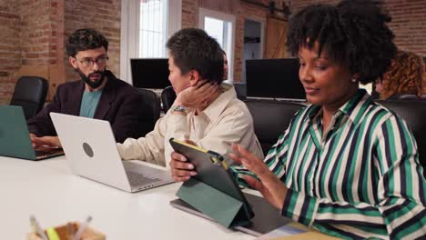 business meeting with diverse team in modern office