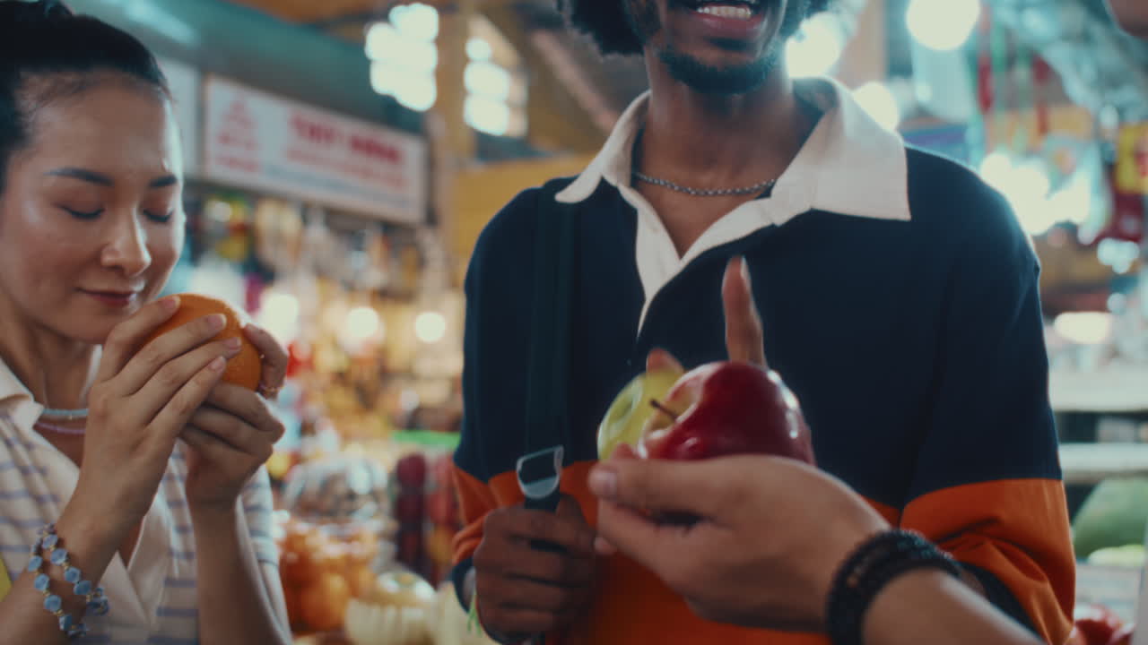 Diverse Friends Buying Fruits on Local Market