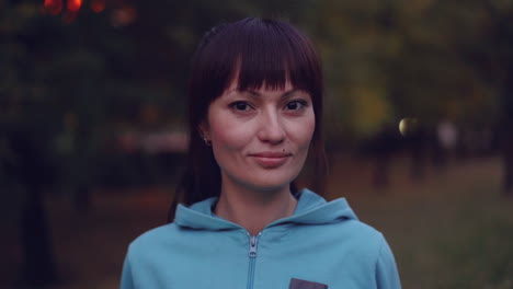 woman in a park at dusk