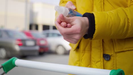 Close-up-video-of-hands-cleaning-with-alcohol-spray