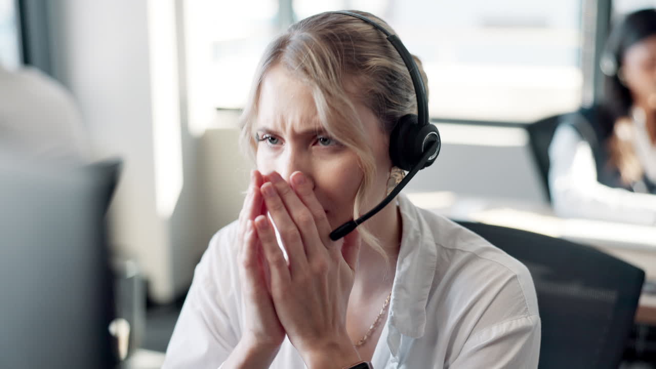 Stressed customer service representative in the office