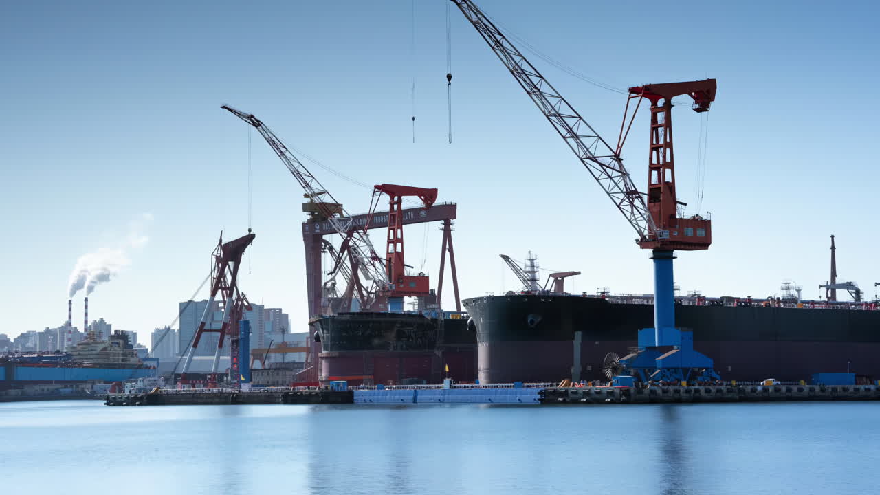 Large ships undergoing construction or repair in a bustling shipyard with numerous industrial cranes.