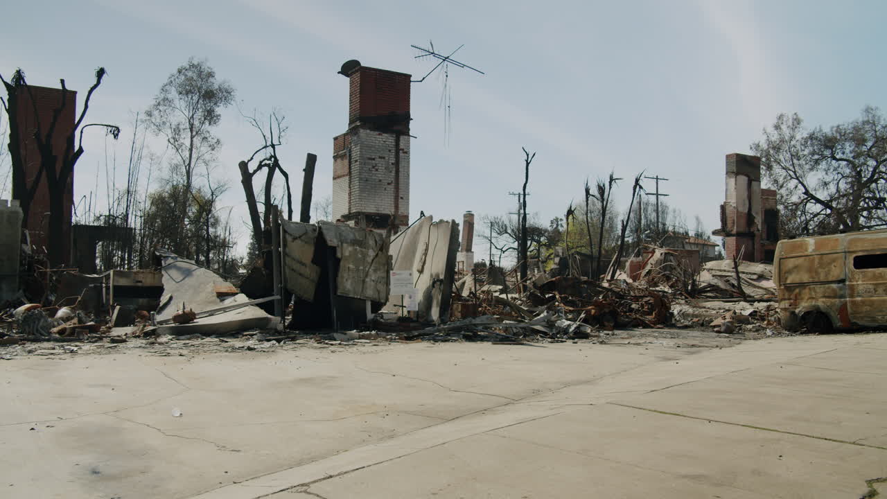 Aftermath of a Fire: Burned Buildings and Van