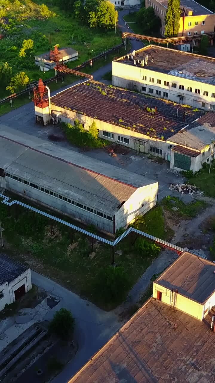 Street On The Old Factory. Desolated street on the old abandoned factory district Vertical video