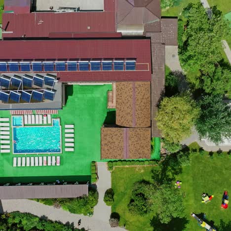 green parks and playgrounds in recreation area. modern resort area among nature in summer. vacation center. drone flight.