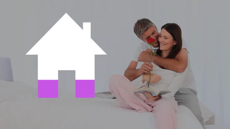 pareja romántica adulta y el icono de la casa llenando rosa