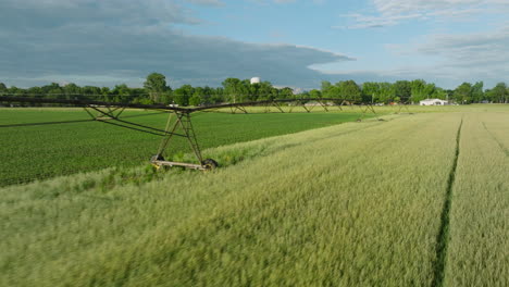 Green-fields-under-blue-skies-in-Dardanelle,-AR,-showcasing-rural-beauty-and-agriculture,-aerial-view