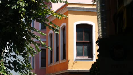 orange building in a sunny city street