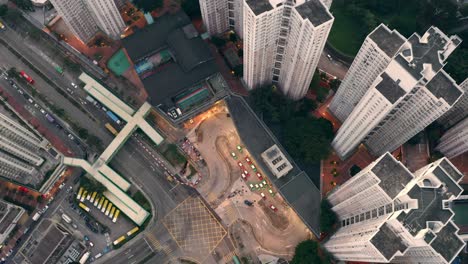 top-view-of-a-bus-terminus-with-many-taxis-waiting-in-an-urban-area