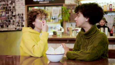 lesbian couple in a bar