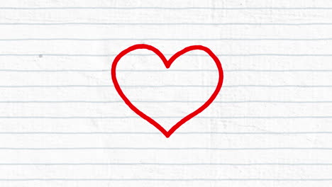 animation of red heart hand drawn with a marker on white lined paper