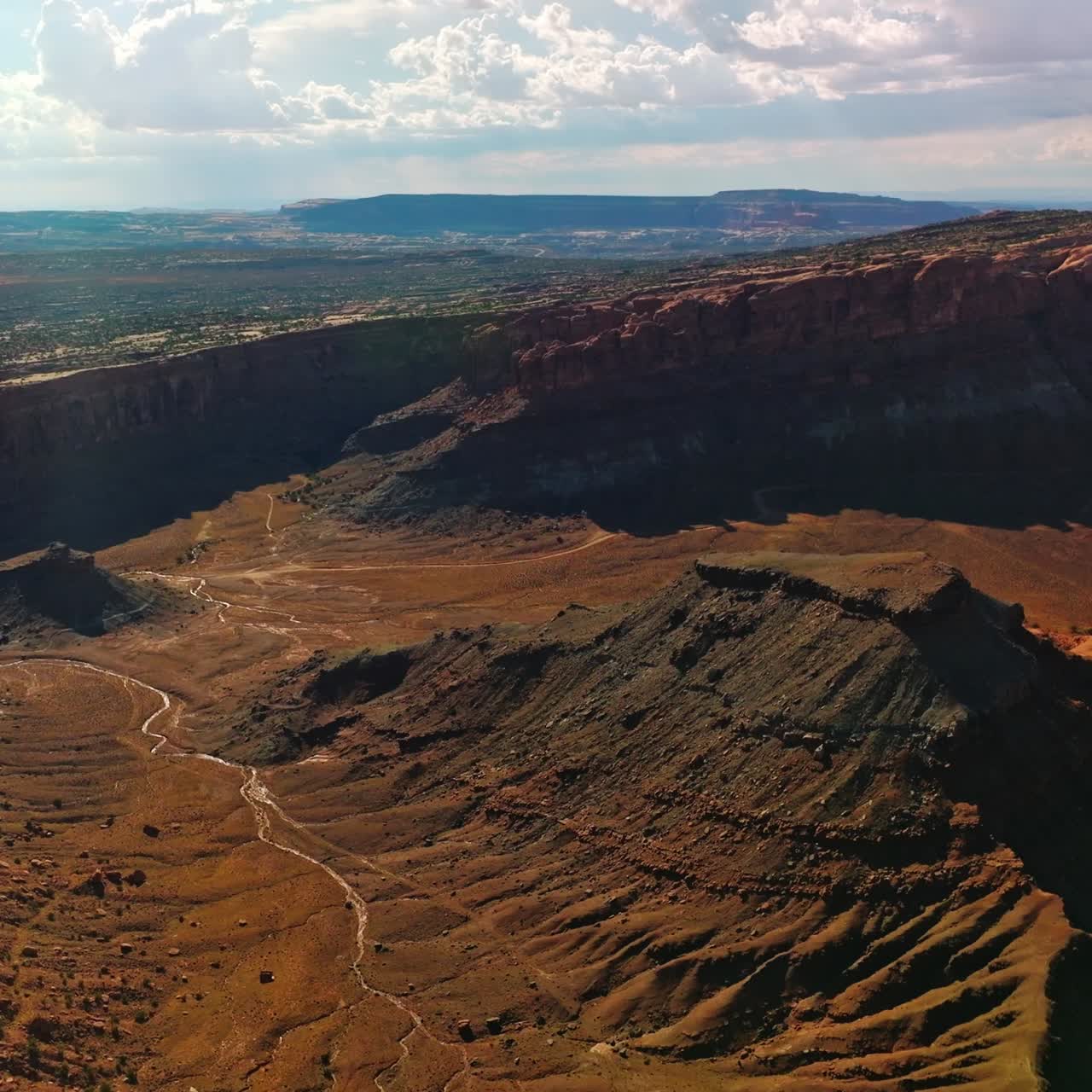 Sunlit scenery of majestic rocks of canyons in Utah, USA. Fascinating panorama of American National park from aerial view