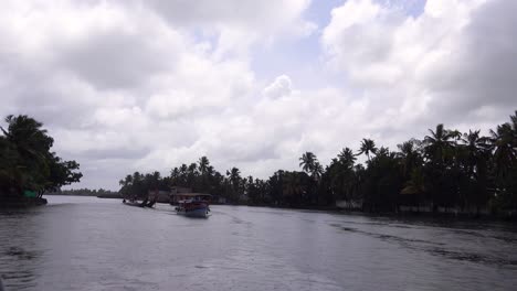 houseboats and activities along the river in the backwaters of kerala india 3