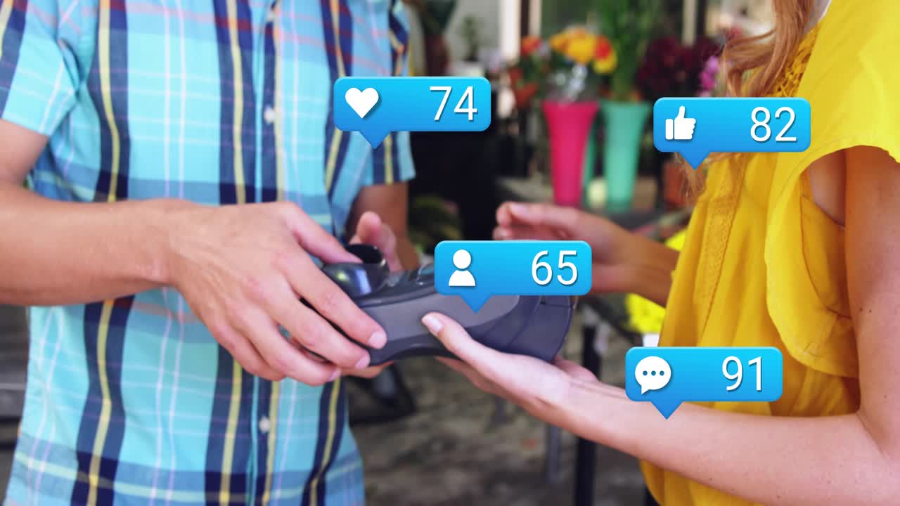 Blue bubbles popping around wicker basket, counts rising, florist lifting terminal, customer taking