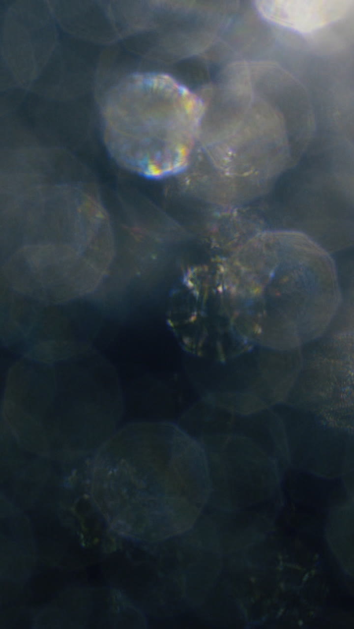Colorful Abstract Bokeh Light Transition on Dark Background