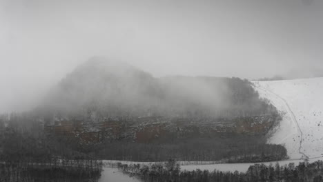 snowy landscape. snow covered forest, winter landscape. fog in fast motion. timelapse