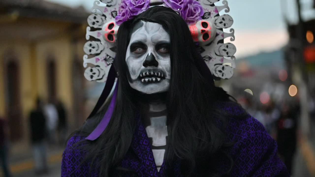 MEXICAN CATRINA WALKING  AT XICO VERACRUZ MEXICO DURING DAY OF DEATH