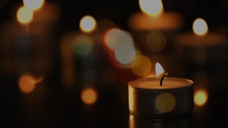 animación de velas de luz de té con manchas de luz parpadeantes