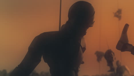 destroyed andorids on a junkyard in yellow light