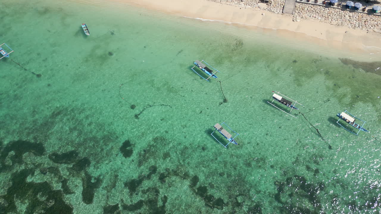 Fishing Boats Floating In Pantai Pandawa Lagoon Uluwatu Bali Indonesia 4K 60FPS