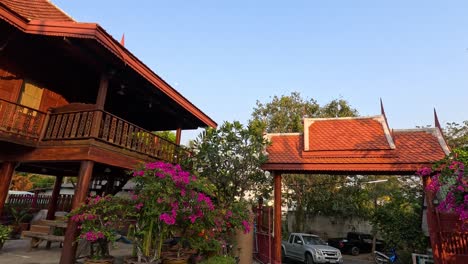 panoramic view of a thai house with garden