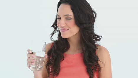 attractive young woman drinks water