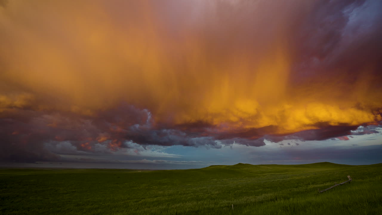 Sunset colors burst the sky into a beautiful powerful orange glow
