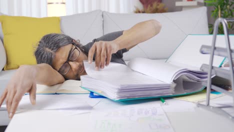 Funny-bored-businessman-falling-asleep-at-the-table-at-home,-sleepy.