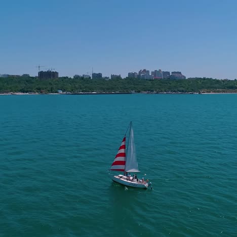 seascape with sail boat. nature seascape with sail boat cruising at sea bay