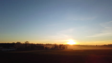 Scenic-view-over-fields-at-sunset-in-the-Black-Forest,-rural-area,-Germany